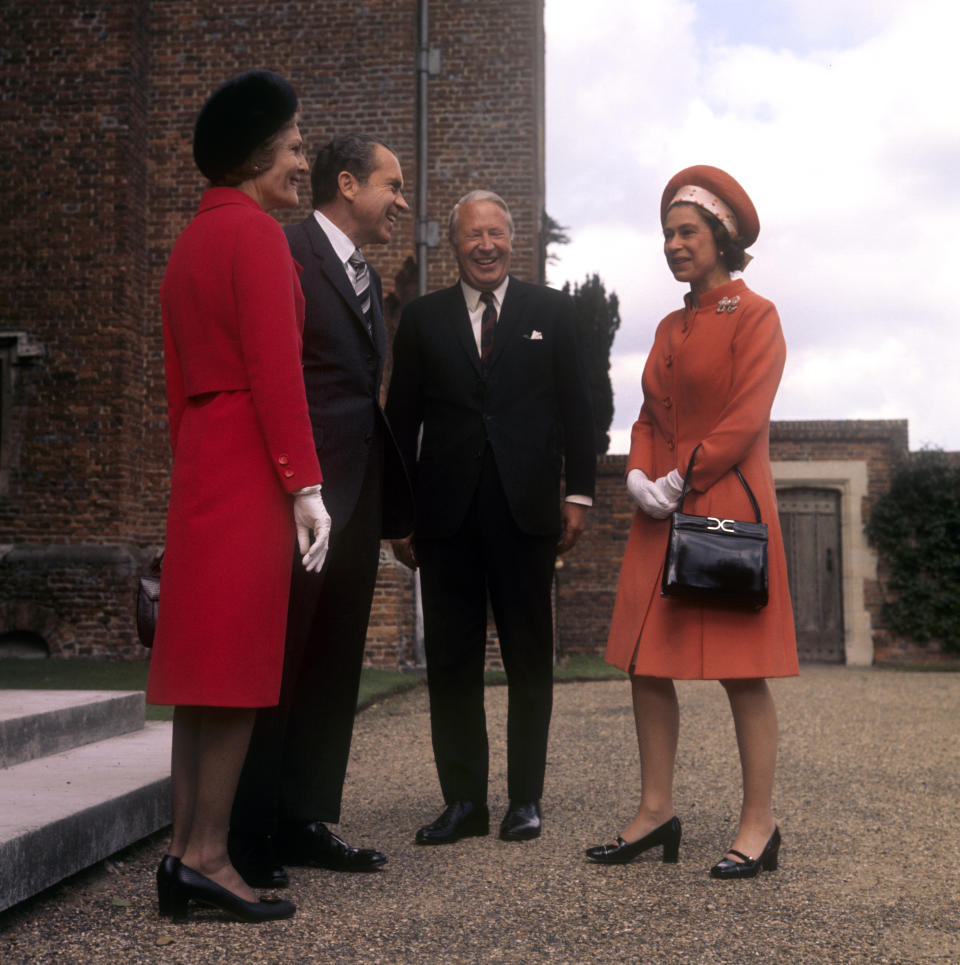 The Queen meeting US President Richard Nixon in 1970, holding her Launer bag. [Photo: PA]