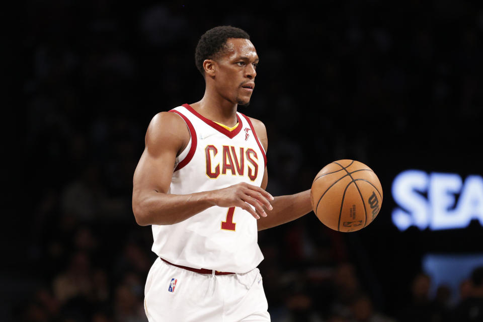 Rajon Rondo #1 of the <a class="link " href="https://sports.yahoo.com/nba/teams/cleveland/" data-i13n="sec:content-canvas;subsec:anchor_text;elm:context_link" data-ylk="slk:Cleveland Cavaliers;sec:content-canvas;subsec:anchor_text;elm:context_link;itc:0">Cleveland Cavaliers</a> dribbles during the second half of the Eastern Conference 2022 Play-In Tournament against the <a class="link " href="https://sports.yahoo.com/nba/teams/brooklyn/" data-i13n="sec:content-canvas;subsec:anchor_text;elm:context_link" data-ylk="slk:Brooklyn Nets;sec:content-canvas;subsec:anchor_text;elm:context_link;itc:0">Brooklyn Nets</a> at Barclays Center on April 12, 2022 in the Brooklyn borough of New York City. The Nets won 115-108. NOTE TO USER: User expressly acknowledges and agrees that, by downloading and or using this photograph, User is consenting to the terms and conditions of the Getty Images License Agreement.