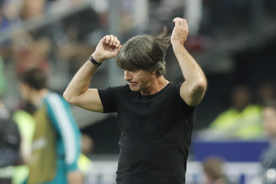 Germany's head coach Joachim Loew reacts as he watches his players during a UEFA Nations League soccer match between France and Germany at Stade de France stadium in Saint Denis, north of Paris, Tuesday, Oct. 16, 2018. (AP Photo/Christophe Ena)