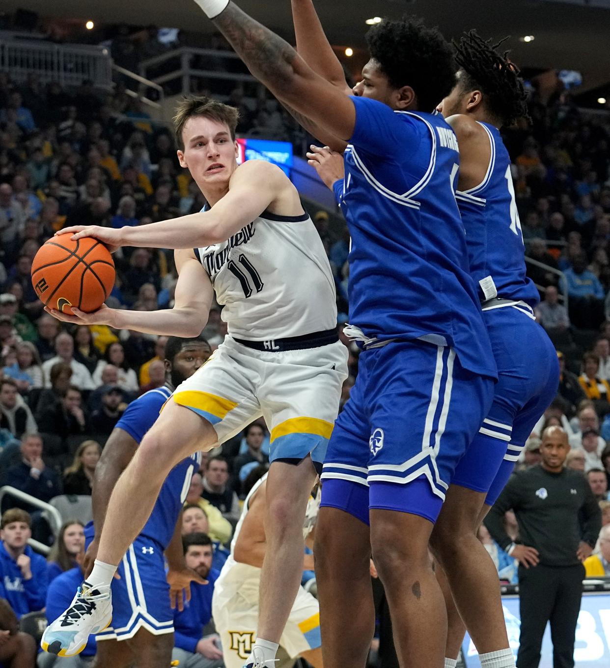 Marquette guard Tyler Kolek (11) finds an open teammate during the first half of their game against Seton Hall Saturday, January 27, 2024 at Fiserv Forum in Milwaukee, Wisconsin.