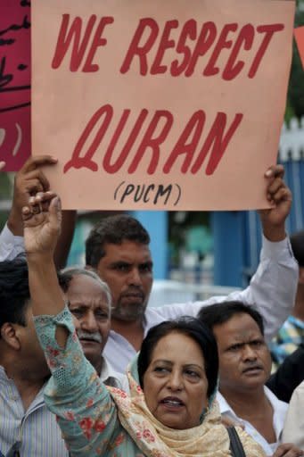 Activists of The Pakistan United Christian Movement shout slogans and carry placards as they protest at a rally for the release of a Christian girl accused of blasphemy in Rawalpindi on September 2. A Pakistani cleric who accused the girl of blasphemy has been remanded in custody on suspicion of evidence-tampering and desecrating the Koran