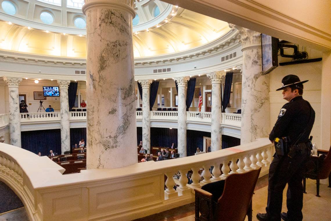 An Idaho State Police officer watches over the Senate chamber during session on Wednesday, March 16, 2022. Budget-setting lawmakers rejected a proposal from Gov. Brad Little to give law enforcement officers an additional 6% raise this year. But lawmakers gave ISP employees pay enhancements separately, one example of a budgeting strategy to target raises agency-by-agency. Sarah A. Miller/smiller@idahostatesman.com