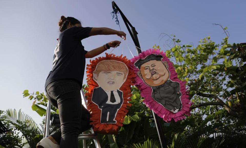 Pinatas of US President Donald Trump and North Korean leader Kim Jong-un, ahead of the their upcoming summit in Singapore