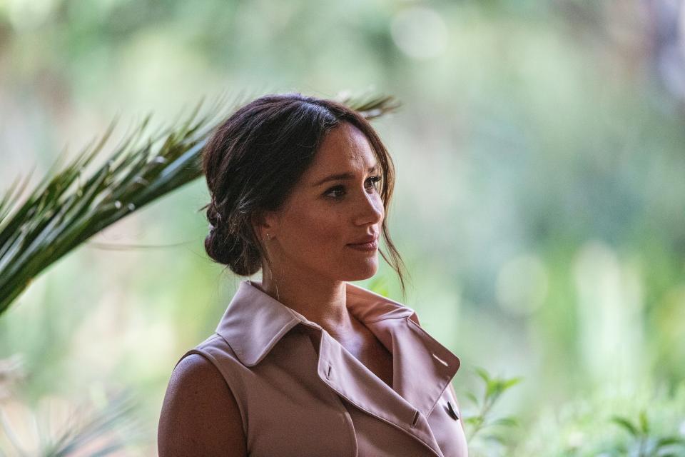 Meghan, the Duchess of Sussex arrives at the British High Commissioner residency where she  will meet with Graca Machel, widow of former South African president Nelson Mandela, in Johannesburg, on October 2, 2019. - Prince Harry recalled the hounding of his late mother Diana to denounce media treatment of his wife Meghan Markle, as the couple launched legal action against a British tabloid for invasion of privacy. (Photo by Michele Spatari / AFP) (Photo by MICHELE SPATARI/AFP via Getty Images)