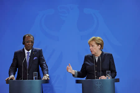 German Chancellor Angela Merkel and Chad President Idriss Deby address the media after a meeting at the Chancellery in Berlin, Germany October 12, 2016. REUTERS/Stefanie Loos