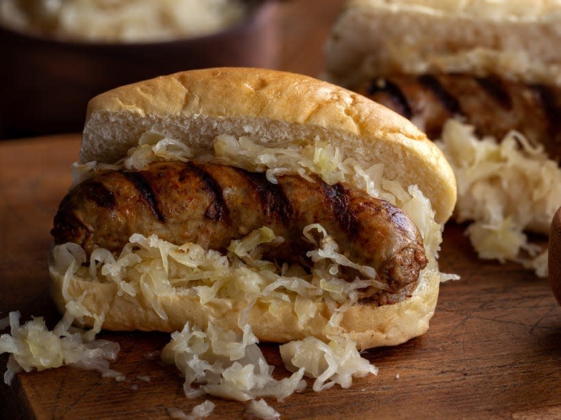 bratwurst with sauerkraut on a bun