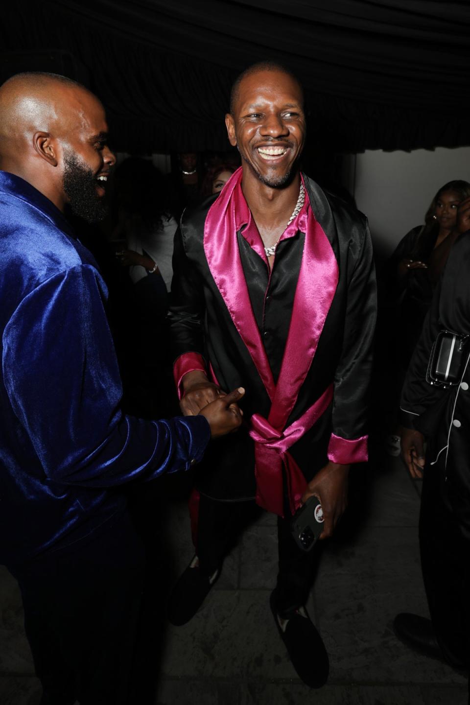 Giggs sported a black and fuschia silk robe to his bash in Essex (Jed Cullen)