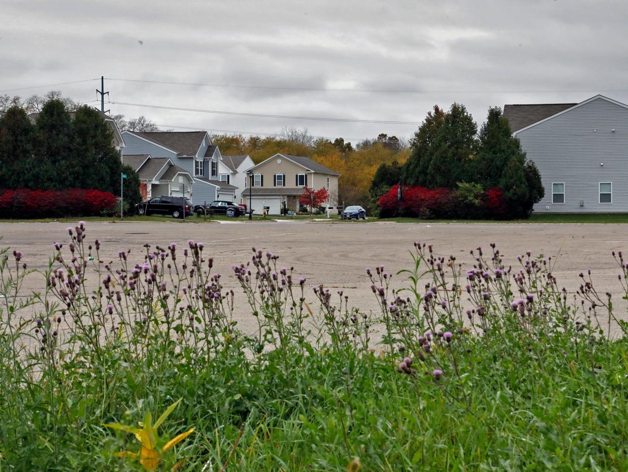 A neighborhood across from an empty parking lot at Eastland Mall. According to data from IMPACT Community Action, the 43232 ZIP code area has been hard hit with eviction filings and requests for rental assistance in recent years. There are several programs available to help people who are struggling with their bills.