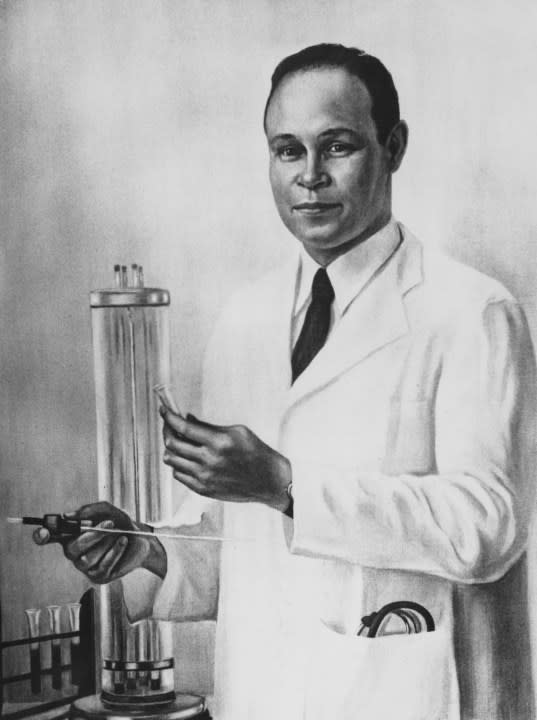 American surgeon and medical researcher Charles R Drew (1904-1950) posing in a lab coat with laboratory equipment, United States, circa 1947. Drew’s pioneering research in the field of blood transfusions assisted the development of improved techniques for blood storage. (Photo by Betsy Graves Reyneau/Three Lions/Hulton Archive/Getty Images)