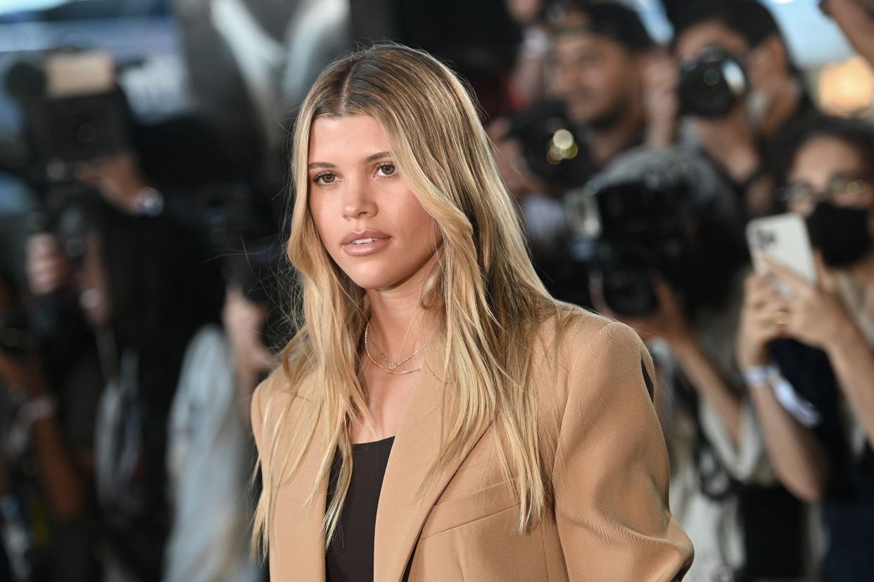  Sofia richie at the michael kors show in a beige suit . 