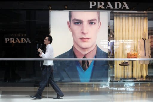 This file photo shows window display of a Prada store in Hong Kong. Italy's top designer brands are looking to China for salvation this year with revenues falling due to a debt crisis that has cast an air of gloom as Milan Fashion Week kicks off on Wednesday