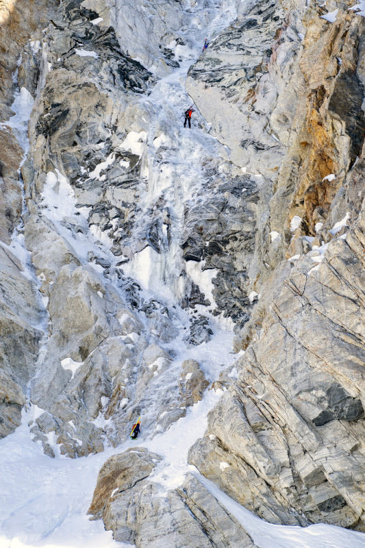 <em>Kai Jones rappels down a section of the Otter Body descent of the Grand Teton.</em><p>Photo: Chris Figenshau/TGR</p>