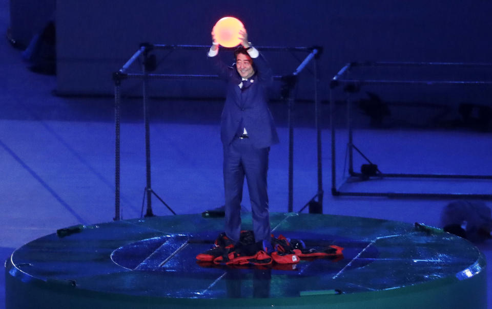 <p>Japanese Prime Minister Shinzo Abe appears during the closing ceremony in the Maracana stadium at the 2016 Summer Olympics in Rio de Janeiro, Brazil, Sunday, Aug. 21, 2016. (AP Photo/Chris Carlson) </p>