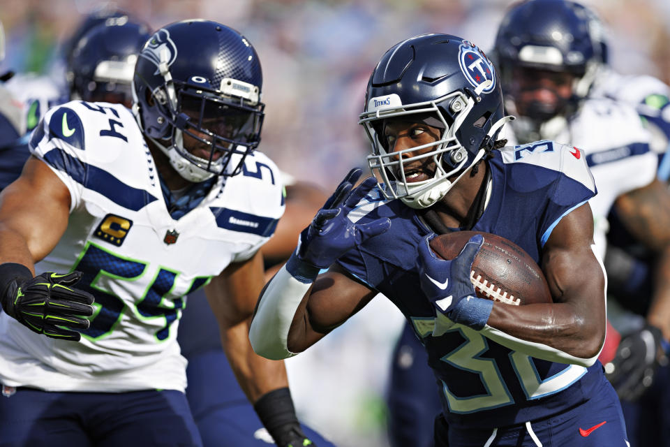 NASHVILLE, TENNESSEE - DECEMBER 24: Tyjae Spears #32 of the Tennessee Titans runs the ball during the game against the Seattle Seahawks at Nissan Stadium on December 24, 2023 in Nashville, Tennessee. The Seahawks defeated the Titans 20-17.  (Photo by Wesley Hitt/Getty Images)