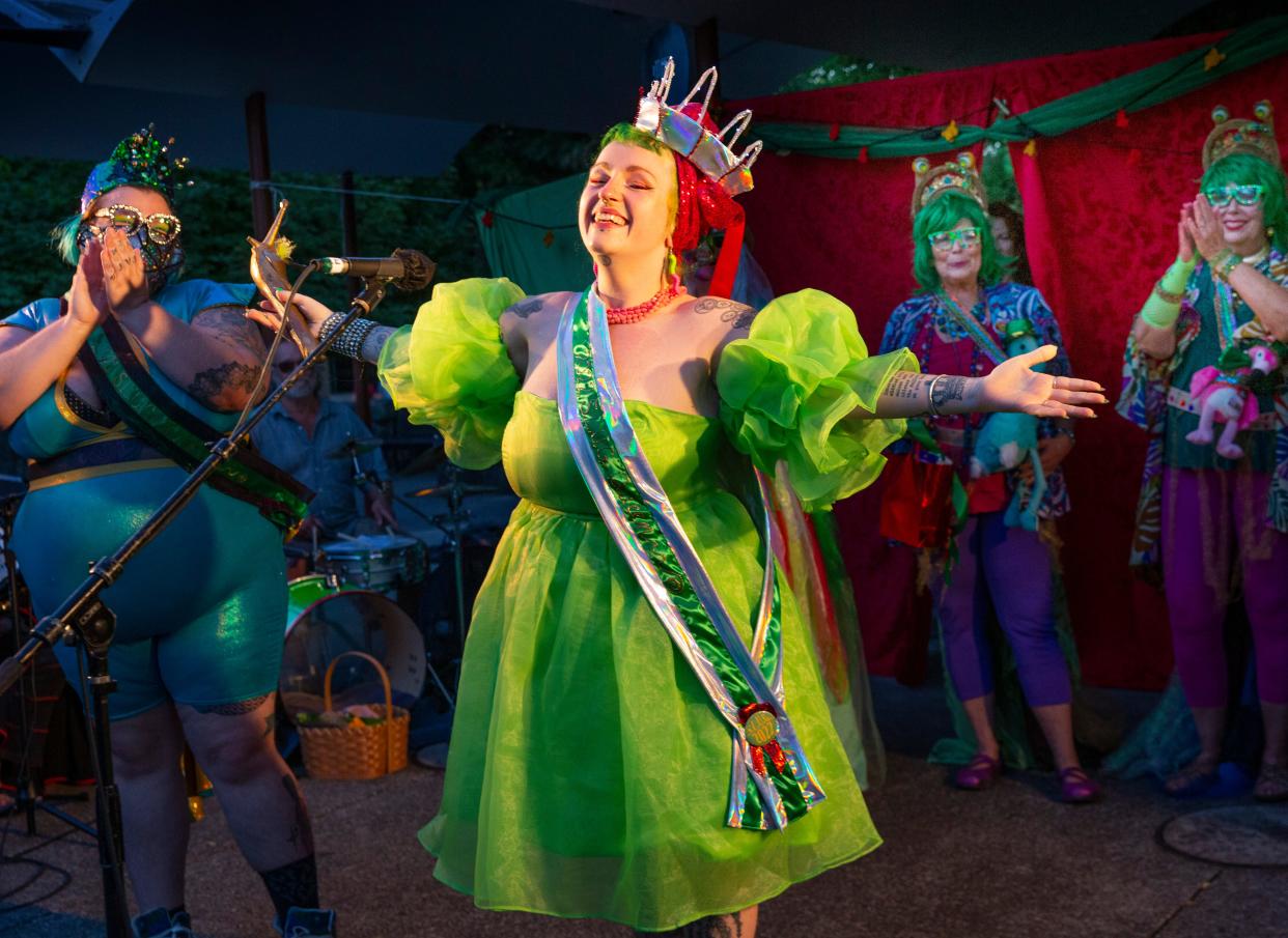 Queen Sativa Slugworth, aka Alyssa Buttons-Garten, center, reacts to being named the 40th Eugene S.L.U.G. Queen during the 2022 competition and coronation ceremony.