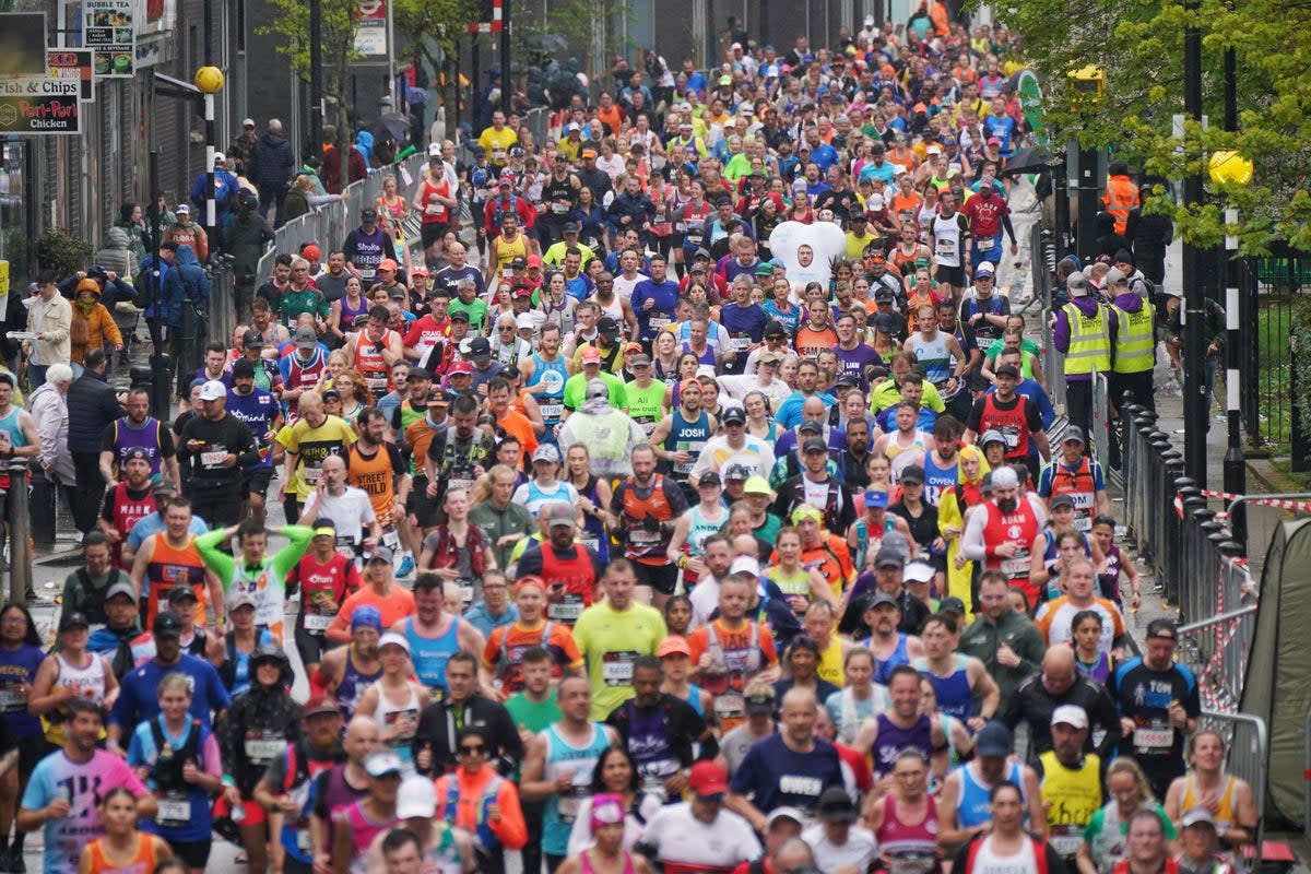 More than 50,000 people are set to finish the race (PA )