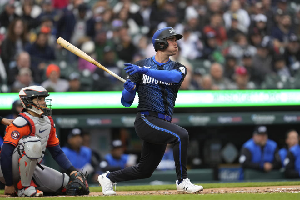 Detroit Tigers' Kerry Carpenter hits a home run against the Houston Astros in the second inning of a baseball game, Saturday, May 11, 2024, in Detroit. (AP Photo/Paul Sancya)