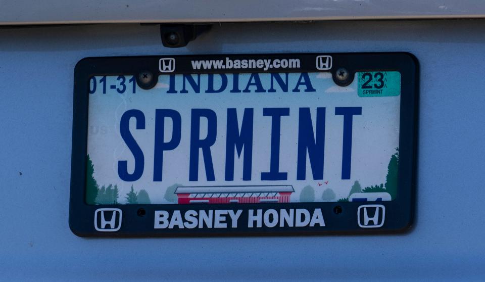 A license plate on a car owned by third-generation mint farmer Randy Matthys, in South Bend, Thursday, June 2, 2022, at Shady Lane Farm, which grows spearmint and peppermint that ends up as oil for various products. 