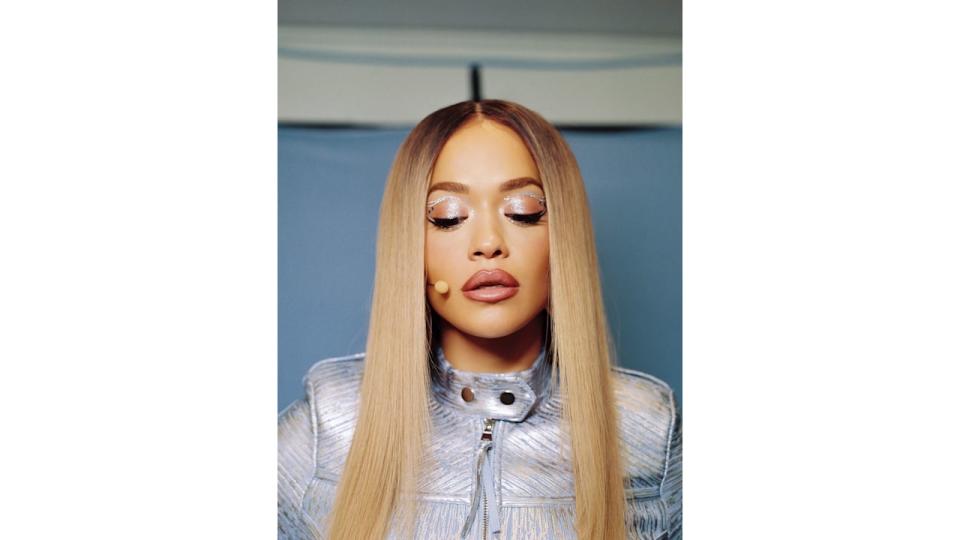 Rita Ora poses in silver makeup created by her go-to makeup artist Chloe Schlossmann 