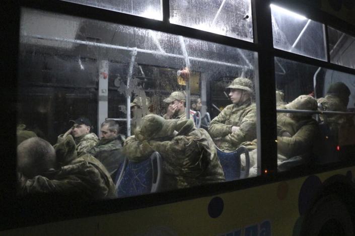 Ukrainian servicemen in a bus