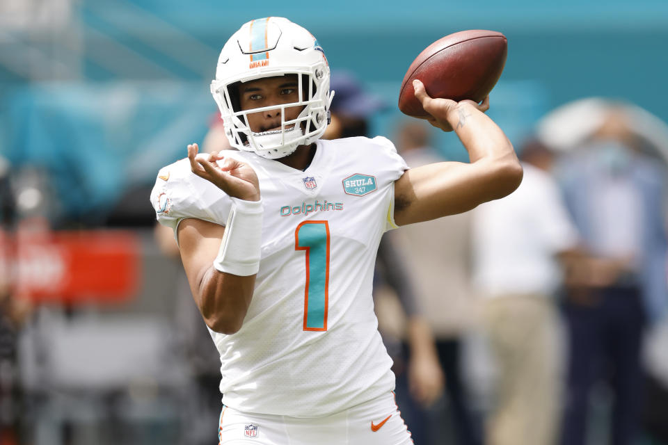 MIAMI GARDENS, FLORIDA - OCTOBER 04: Tua Tagovailoa #1 of the Miami Dolphins warms up prior to the game against the Seattle Seahawks at Hard Rock Stadium on October 04, 2020 in Miami Gardens, Florida. (Photo by Michael Reaves/Getty Images)