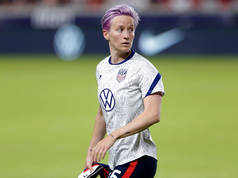 Megan Rapinoe warms up before USWNT match in June 2021.