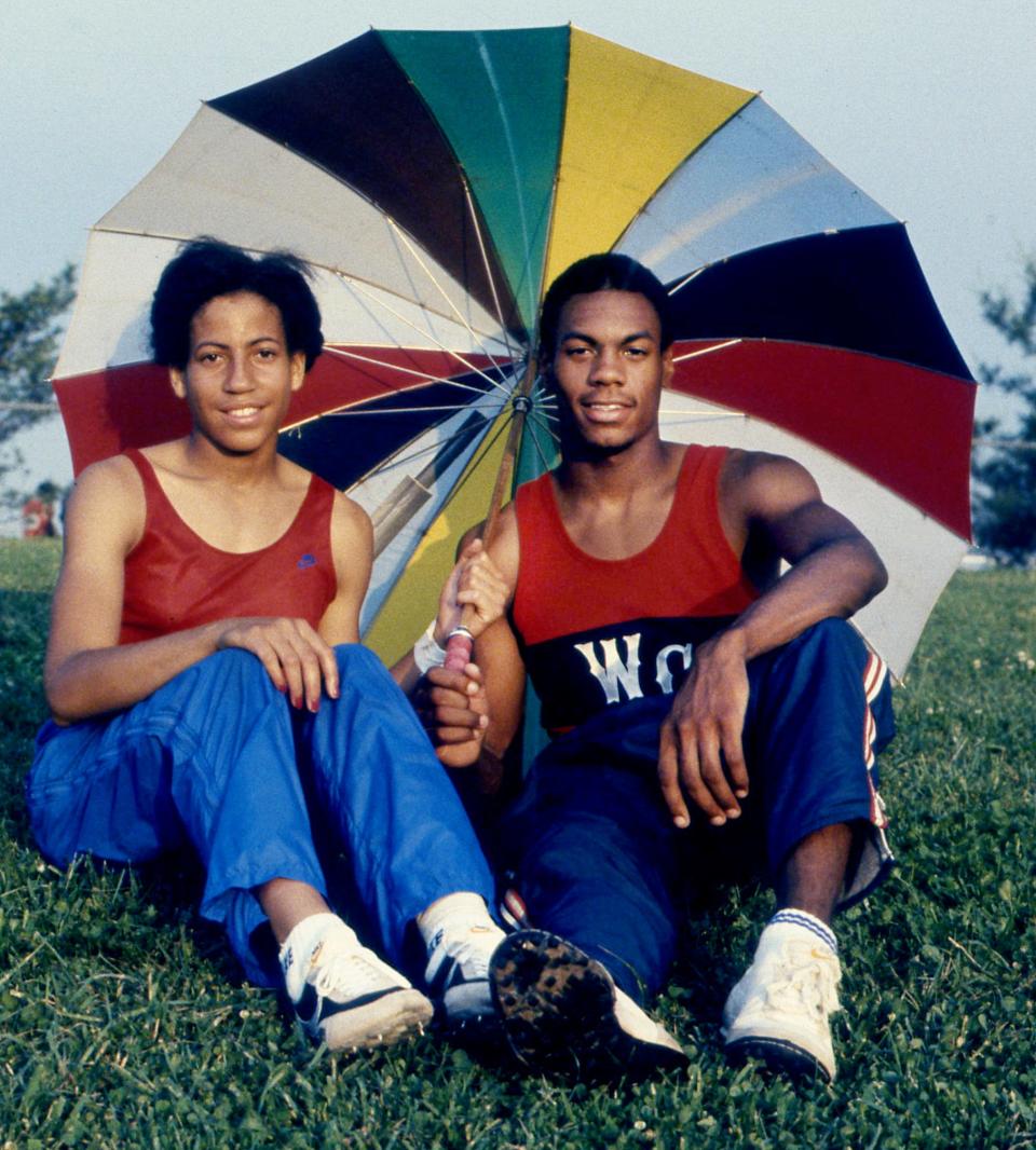 Jackie Cowan, Whites Creek High (1979-82): Here, Cowan, left, also a standout track star, poses with Whites Creek’s Dwight Johnson at McGavock High School on May 15, 1982. They were named The Tennessean’s Trackwoman and Trackman of the Year for the school year.