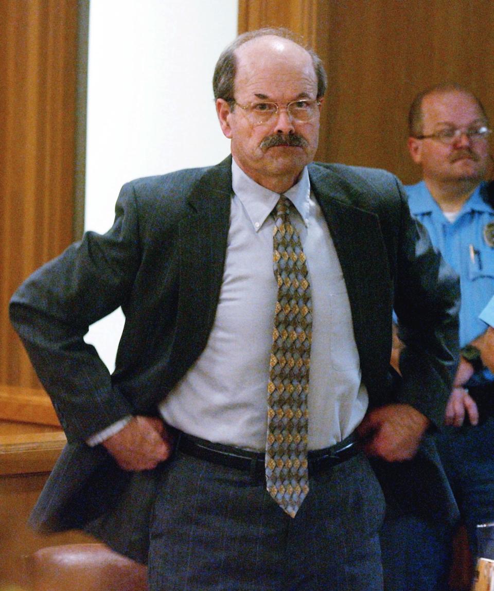 Dennis Rader is seen in a Sedgwick County courtroom in Wichita, Kan. during the first day of testimony in the sentencing phase of his trial on Wednesday, Aug. 17, 2005. Rader, also known as BTK, a 60-year-old former church congregation president and Boy Scout leader, pleaded guilty in June to 10 murders that haunted Wichita over three decades. (AP Photo/Bo Rader, Pool)