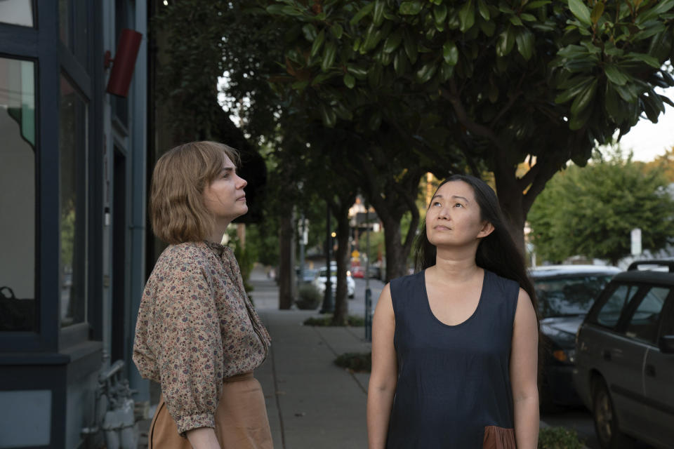 This image released by A24 shows Michelle Williams, left, and Hong Chau in a scene from "Showing Up." (Allyson Riggs/A24 via AP)