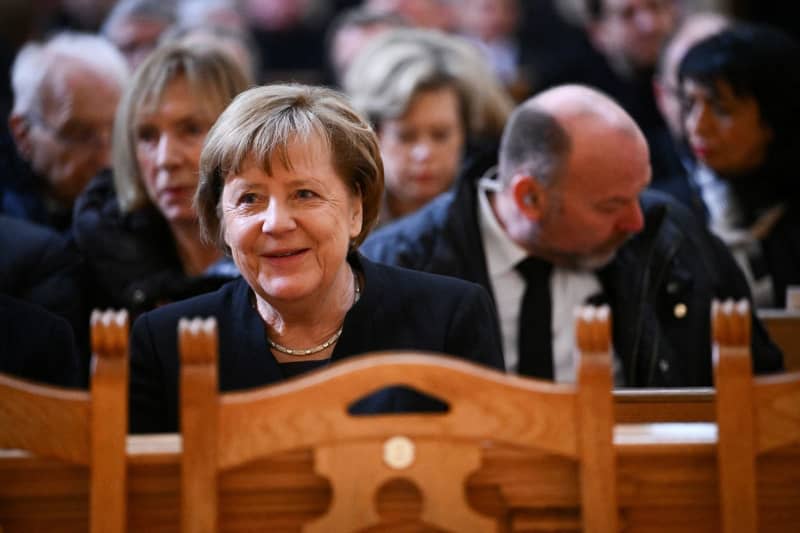 Angela Merkel, former German Chancellor, speaks with Robert Habeck German Minister for Economic Affairs and Climate Protection, before the start of the memorial service to mark the act of mourning for Wolfgang Schaeuble in Berlin Cathedral. Annegret Hilse/Reuters/Pool/dpa