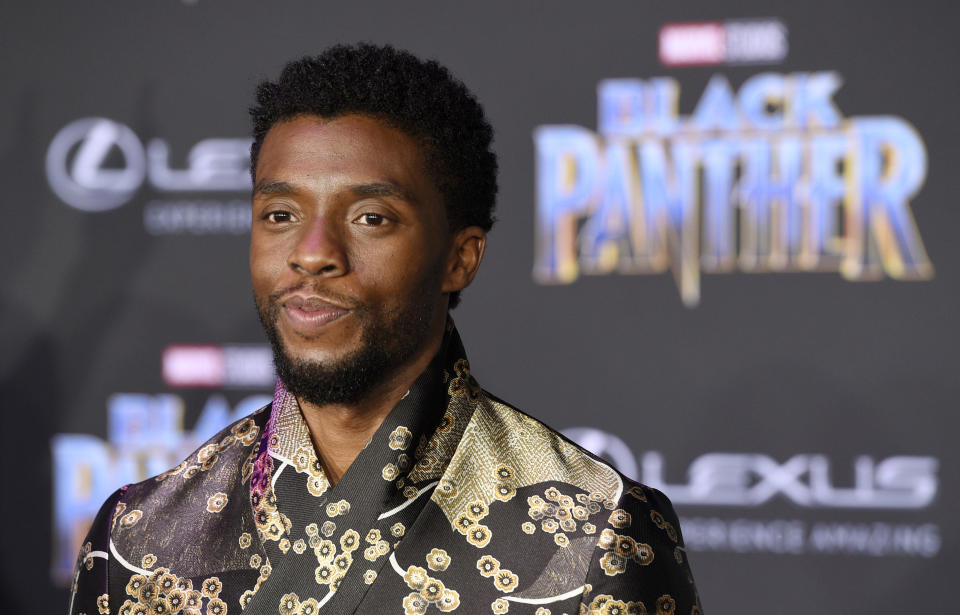 FILE - In this Jan. 29, 2018 file photo, Chadwick Boseman, a cast member in "Black Panther," poses at the premiere of the film in Los Angeles. The box office hit has been nominated for various awards and is poised to be the first comic book film to be nominated for an Oscar for best picture. (Photo by Chris Pizzello/Invision/AP, File)