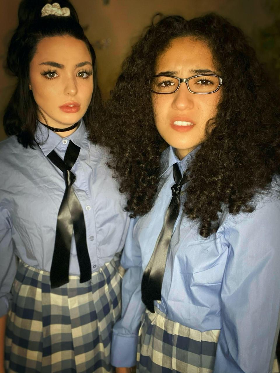 Two women dressed as Lily Moscovitz and Mia Thermompolis from "Princess Diaries."