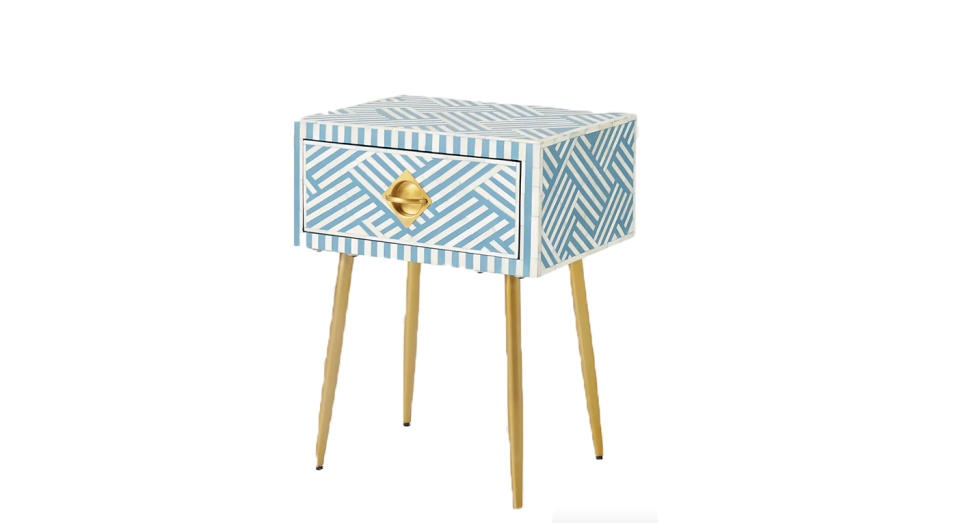 Anthropologie's stunning vintage-inspired nightstand is a luxurious way to decorate your bedroom.