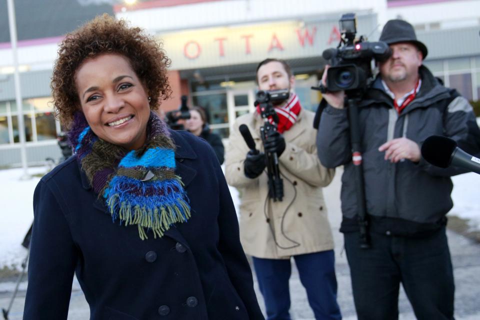 REFILE - CORRECTING PLANE MODEL Former Governor General of Canada Michaelle Jean prepares to board the Royal Canadian Air Force Airbus CC-150 Polaris for a trip to Johannesburg, South Africa, to attend a public memorial for former South African President Nelson Mandela, in Ottawa December 8, 2013. REUTERS/Blair Gable (CANADA - Tags: POLITICS)