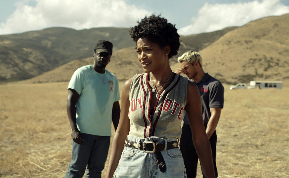 This image released by Universal Pictures shows, from left, Daniel Kaluuya, Keke Palmer, and Brandon Perea in a scene from "Nope." (Universal Pictures via AP)