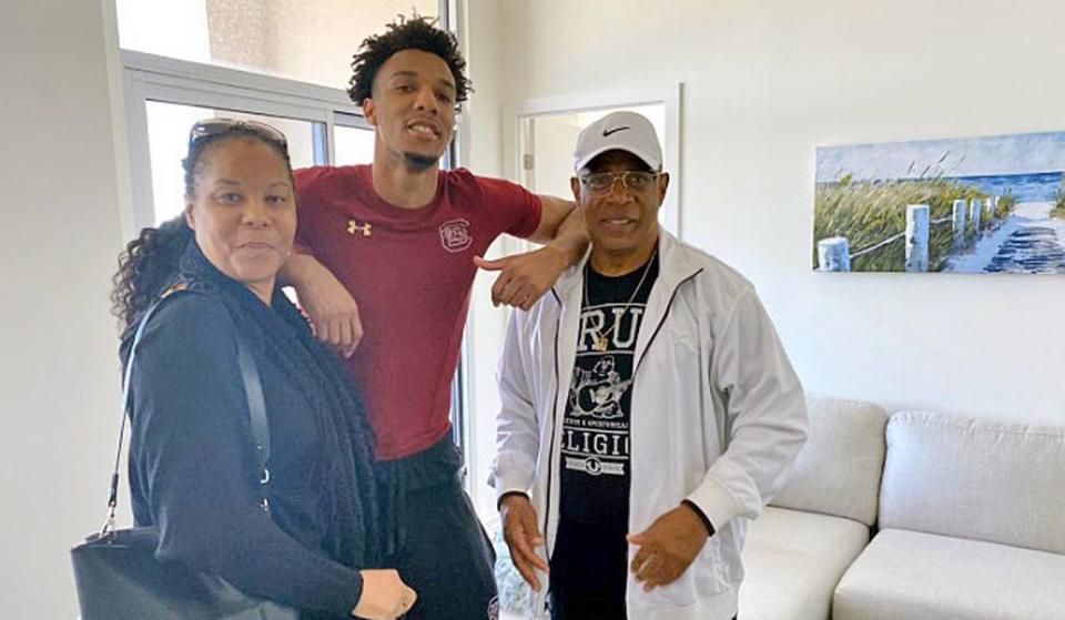 Gamecocks guard A.J. Lawson with parents Anthony Lawson and Kathleen Parchment.