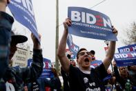 People rally outside the tenth Democratic 2020 presidential debate at the Gaillard Center in Charleston