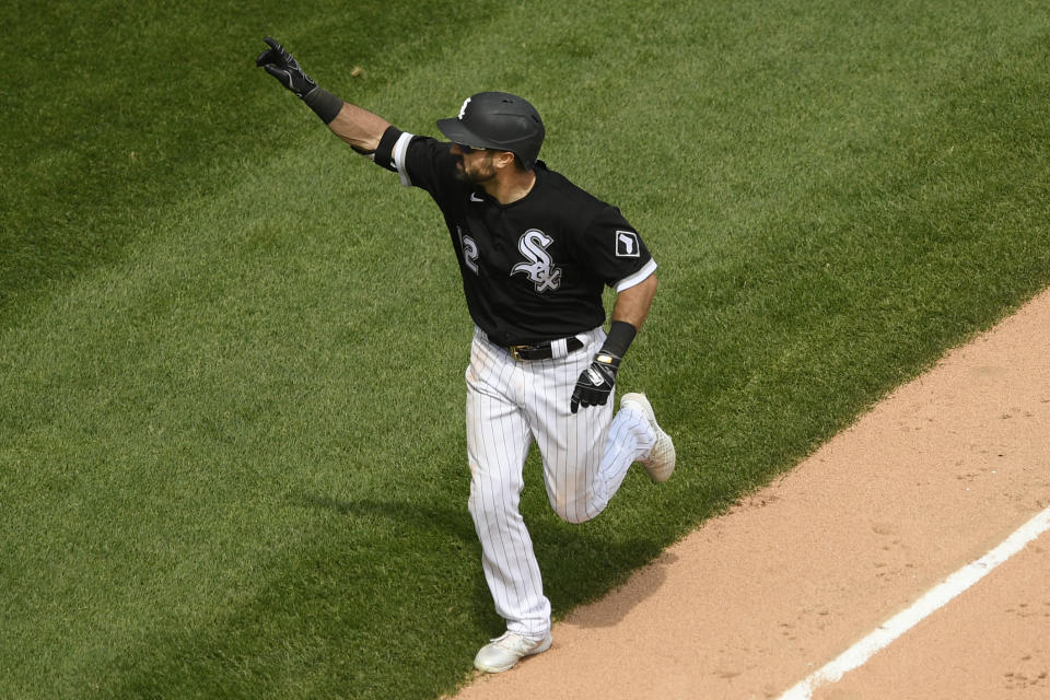 Chicago White Sox's Adam Eaton (12) celebrates while rounding the bases after hitting a two-run home run during the fifth inning of a baseball game against the Kansas City Royals Sunday, May 16, 2021, in Chicago. (AP Photo/Paul Beaty)