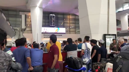 Crowds of people are seen at the Indira Gandhi International Airport in Delhi, India, April 27, 2019 in this picture obtained from social media. GARVITA GROVER/via REUTERS