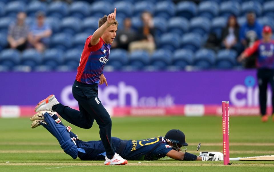 Sam Curran of England runs out Danushka Gunathilaka  - Gareth Copley/Getty Images