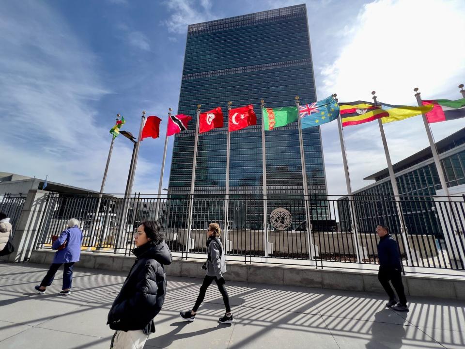 The Un headquarters is seen from outside on a sunny day.