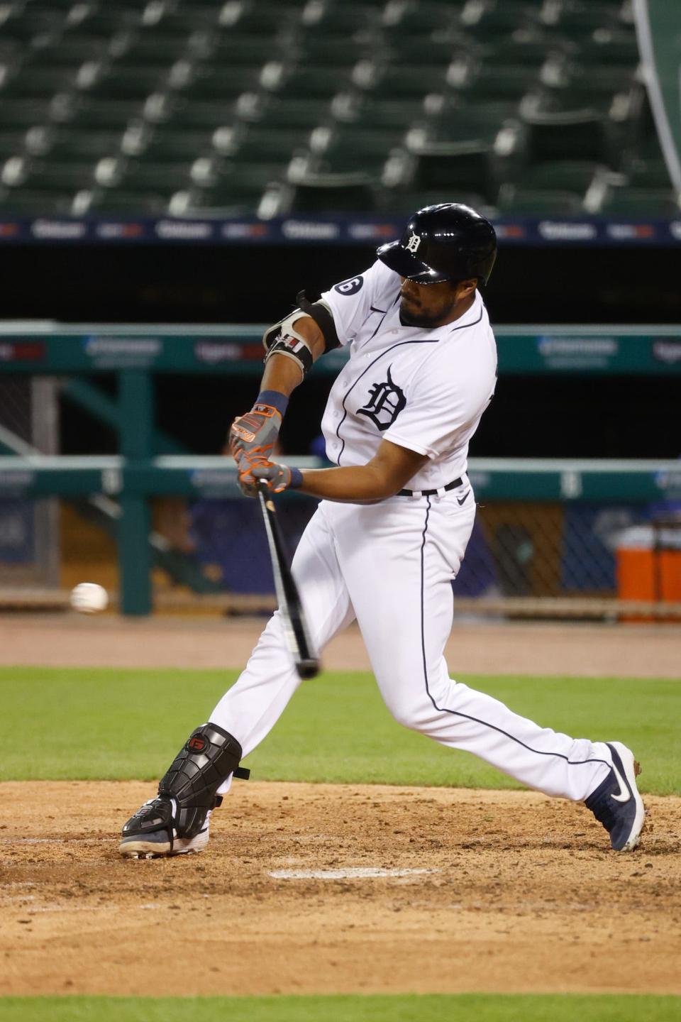 Detroit Tigers third baseman Jeimer Candelario (46) hits a single in the fifth inning against the Kansas City Royals at Comerica Park.