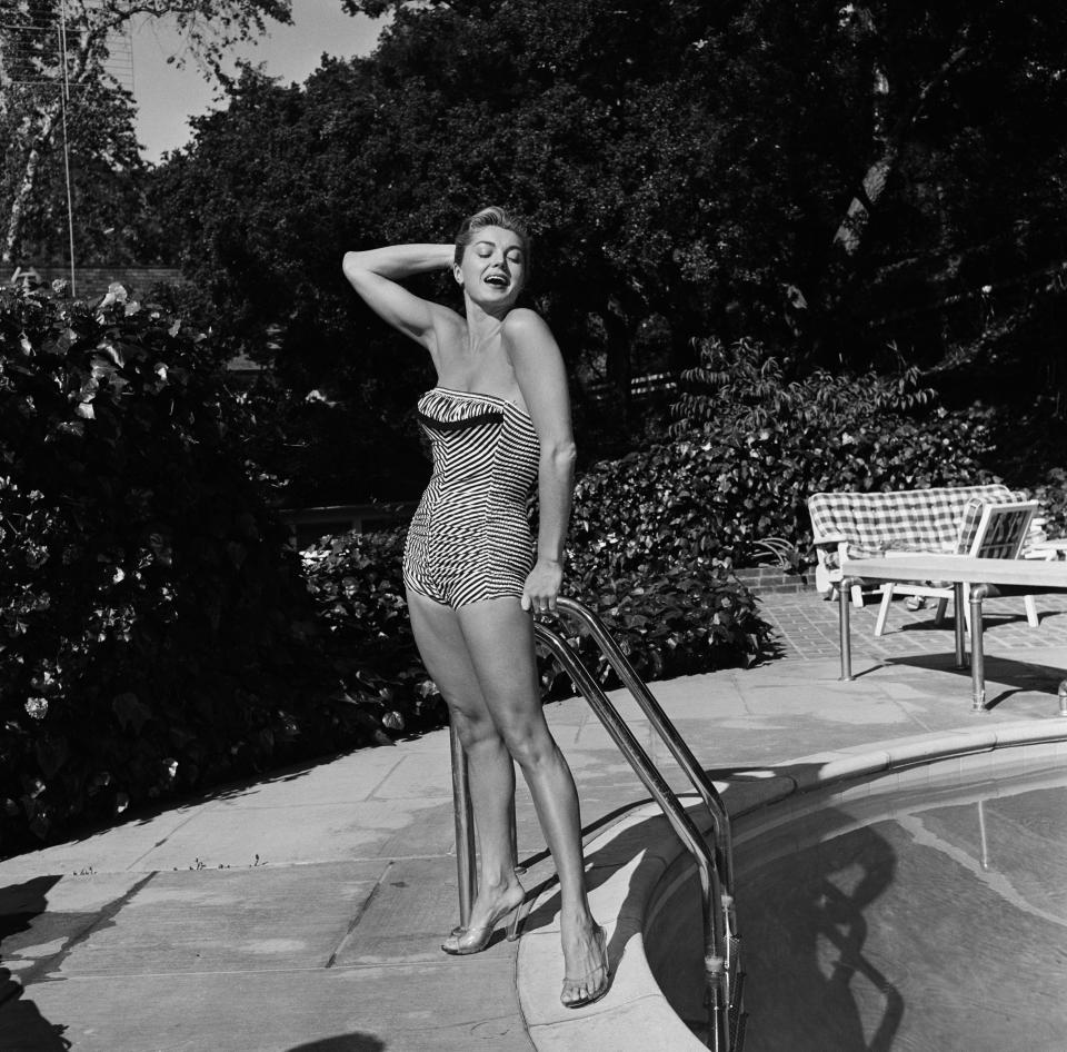 In a swimsuit during "The Esther Williams Aqua Special" in 1956.