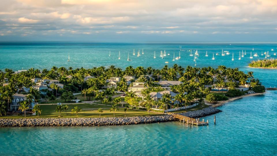 Panoramic sunrise landscape view of the small Islands Sunset Key and Wisteria Island of the Island of Key West, Florida Keys.