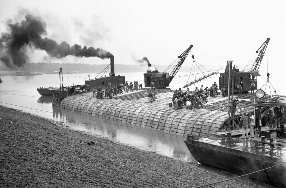 Laying revetment mats on the Mississippi River at Memphis circa 1947. (Courtesy U.S. Army Corps of Engineers, Memphis District)