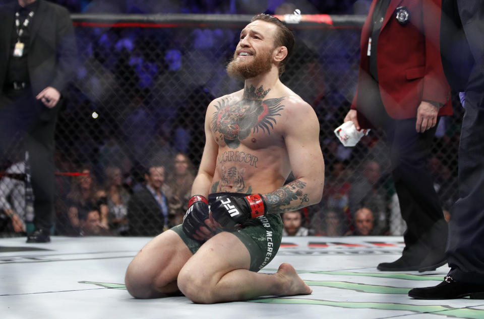 Conor McGregor smiles after defeating Donald "Cowboy" Cerrone during a UFC 246 welterweight mixed martial arts bout Saturday, Jan. 18, 2020, in Las Vegas. (AP Photo/John Locher)