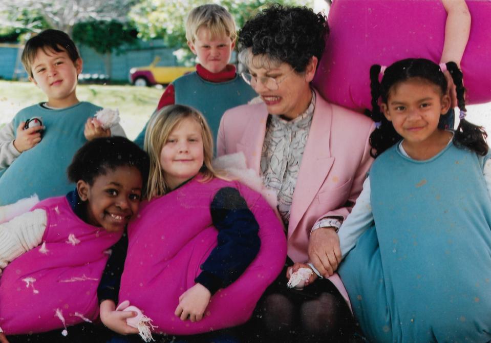 Children dress up as "loves" and "grouches" from Larne Neuland's book, "Let's take a Peek at our Thoughts."