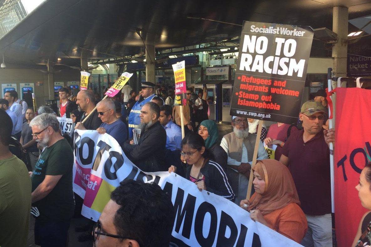 Protesters: Demonstrators gathered for a protest against hate crime in east London: Stand Up To Racism