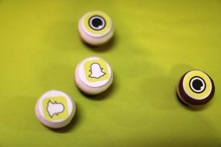 The logo of messaging app Snapchat is seen at a booth at TechFair LA, a technology job fair, in Los Angeles, California, U.S., January 26, 2017. REUTERS/Lucy Nicholson