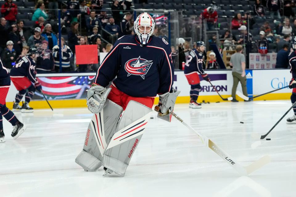 Mar 3, 2023; Columbus, Ohio, USA;  Columbus Blue Jackets goaltender Michael Hutchinson (31) warms up prior to the NHL hockey game against the Seattle Kraken at Nationwide Arena. Mandatory Credit: Adam Cairns-The Columbus Dispatch